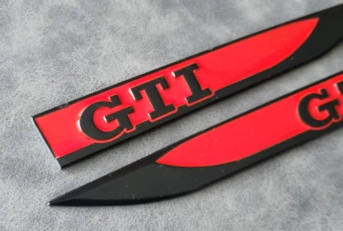VW Golf GTI Wing Badges Black/Red WheelCapo